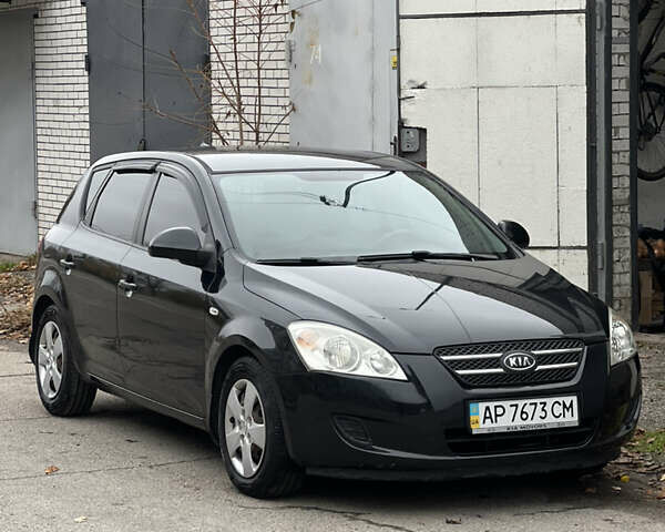 Чорний Кіа Сід, об'ємом двигуна 1.4 л та пробігом 230 тис. км за 5850 $, фото 1 на Automoto.ua
