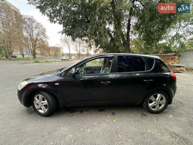 Черный Киа Сид, объемом двигателя 2 л и пробегом 224 тыс. км за 6300 $, фото 1 на Automoto.ua