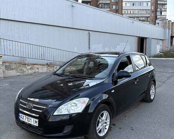 Чорний Кіа Сід, об'ємом двигуна 1.4 л та пробігом 204 тис. км за 4700 $, фото 1 на Automoto.ua