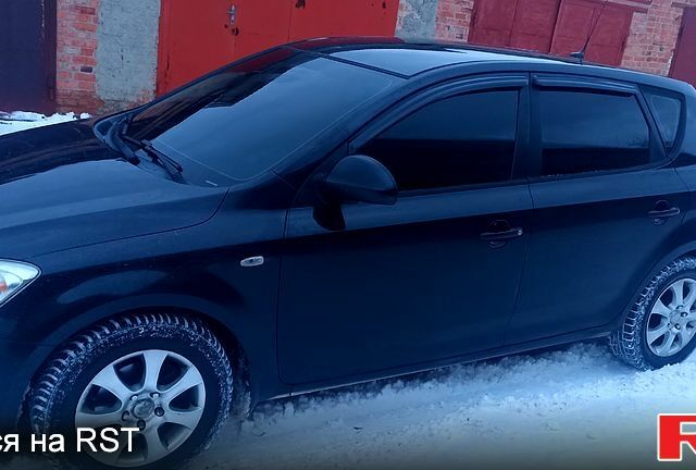 Черный Киа Сид, объемом двигателя 1.6 л и пробегом 214 тыс. км за 5500 $, фото 1 на Automoto.ua