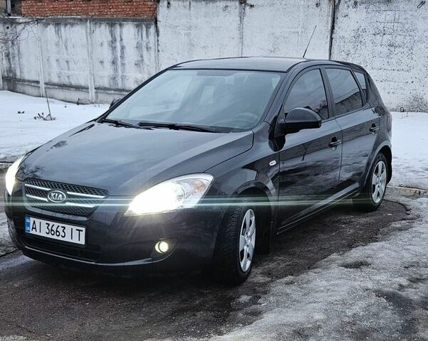 Чорний Кіа Сід, об'ємом двигуна 1.58 л та пробігом 255 тис. км за 5500 $, фото 1 на Automoto.ua