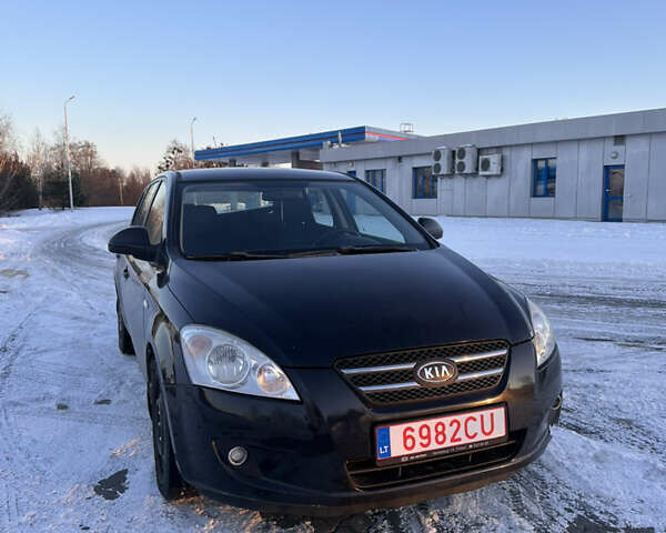Чорний Кіа Сід, об'ємом двигуна 1.4 л та пробігом 165 тис. км за 6750 $, фото 1 на Automoto.ua