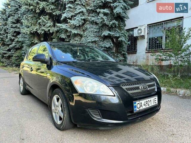 Черный Киа Сид, объемом двигателя 1.58 л и пробегом 220 тыс. км за 4700 $, фото 1 на Automoto.ua