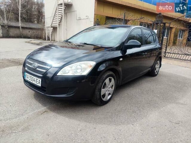 Черный Киа Сид, объемом двигателя 1.4 л и пробегом 310 тыс. км за 4900 $, фото 1 на Automoto.ua