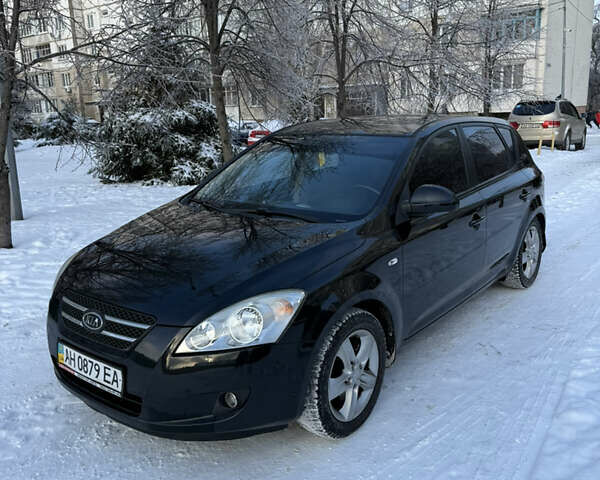 Чорний Кіа Сід, об'ємом двигуна 2 л та пробігом 115 тис. км за 6900 $, фото 1 на Automoto.ua