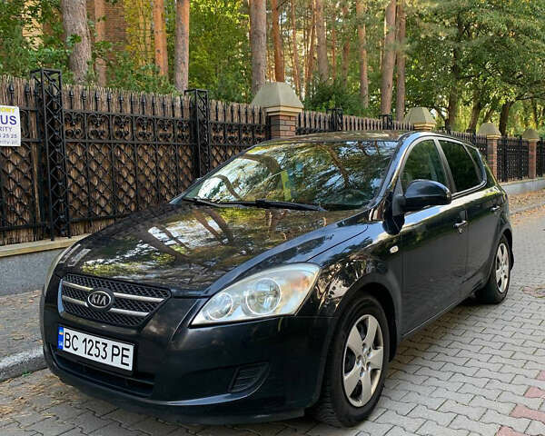 Черный Киа Сид, объемом двигателя 1.4 л и пробегом 259 тыс. км за 6000 $, фото 1 на Automoto.ua