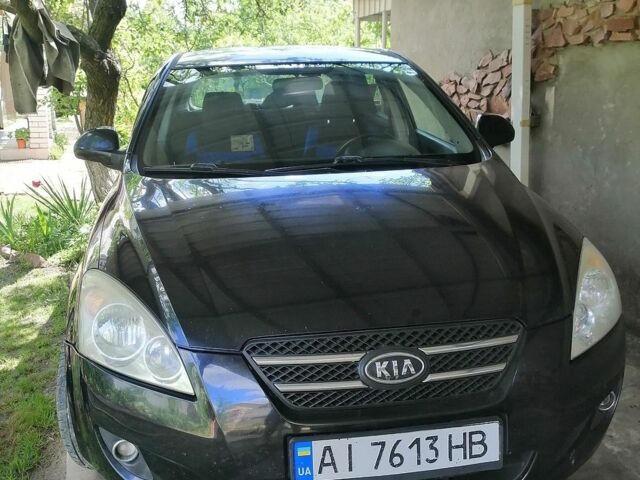 Чорний Кіа Сід, об'ємом двигуна 1.4 л та пробігом 215 тис. км за 5300 $, фото 1 на Automoto.ua
