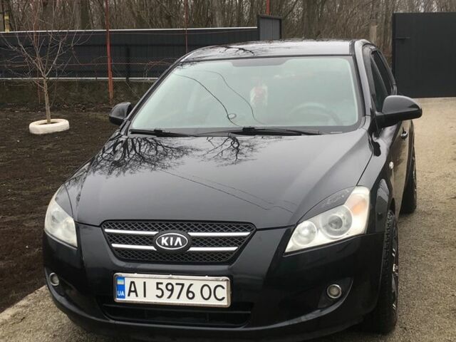Чорний Кіа Сід, об'ємом двигуна 1.6 л та пробігом 203 тис. км за 5450 $, фото 1 на Automoto.ua