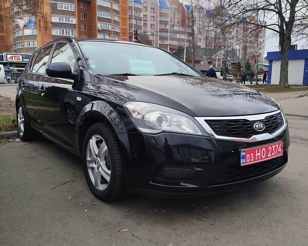 Черный Киа Сид, объемом двигателя 1.4 л и пробегом 215 тыс. км за 6000 $, фото 1 на Automoto.ua