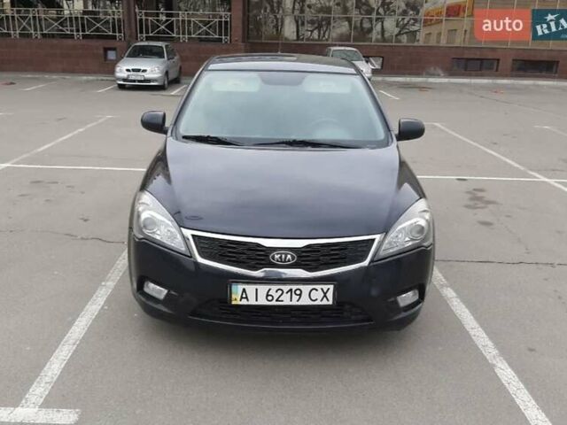 Черный Киа Сид, объемом двигателя 1.6 л и пробегом 330 тыс. км за 5800 $, фото 1 на Automoto.ua