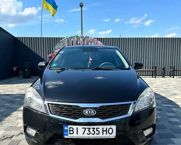 Чорний Кіа Сід, об'ємом двигуна 1.59 л та пробігом 136 тис. км за 7000 $, фото 1 на Automoto.ua