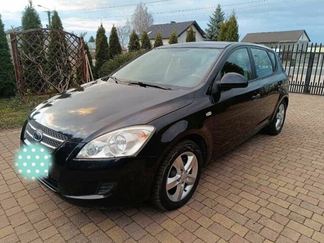 Чорний Кіа Сід, об'ємом двигуна 1.4 л та пробігом 159 тис. км за 4911 $, фото 1 на Automoto.ua