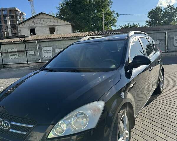 Черный Киа Сид, объемом двигателя 1.6 л и пробегом 300 тыс. км за 5800 $, фото 1 на Automoto.ua