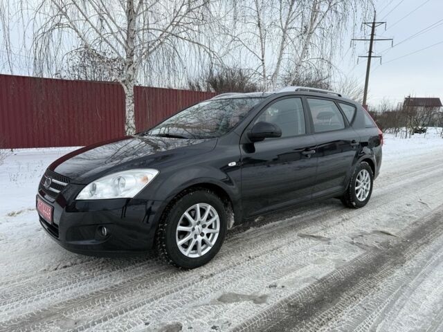 Черный Киа Сид, объемом двигателя 1.4 л и пробегом 204 тыс. км за 6500 $, фото 1 на Automoto.ua