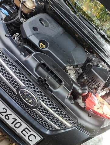 Черный Киа Сид, объемом двигателя 1.58 л и пробегом 317 тыс. км за 5000 $, фото 1 на Automoto.ua