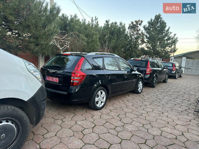 Чорний Кіа Сід, об'ємом двигуна 1.6 л та пробігом 203 тис. км за 6500 $, фото 1 на Automoto.ua