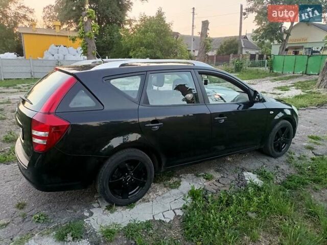 Черный Киа Сид, объемом двигателя 1.4 л и пробегом 197 тыс. км за 5800 $, фото 1 на Automoto.ua