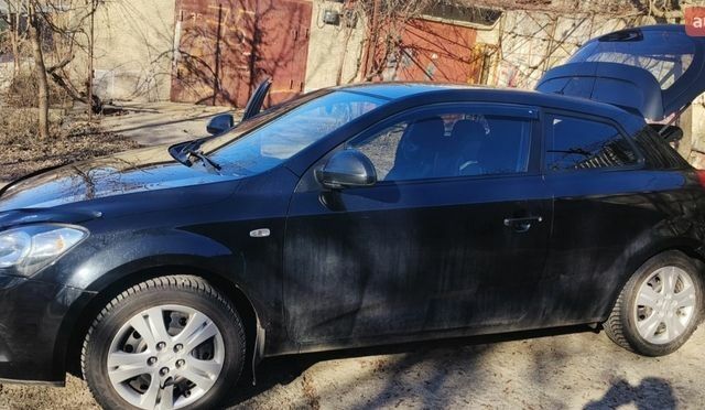 Черный Киа Сид, объемом двигателя 1.6 л и пробегом 203 тыс. км за 7000 $, фото 1 на Automoto.ua