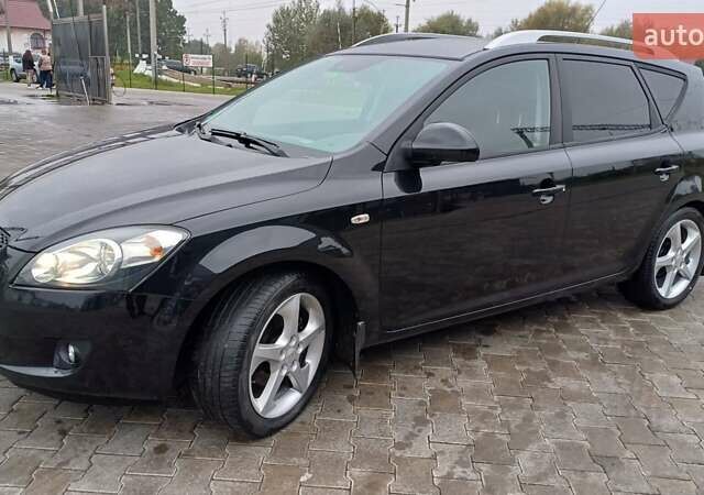 Черный Киа Сид, объемом двигателя 2 л и пробегом 195 тыс. км за 6499 $, фото 1 на Automoto.ua
