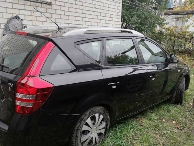 Черный Киа Сид, объемом двигателя 1.4 л и пробегом 175 тыс. км за 5700 $, фото 1 на Automoto.ua