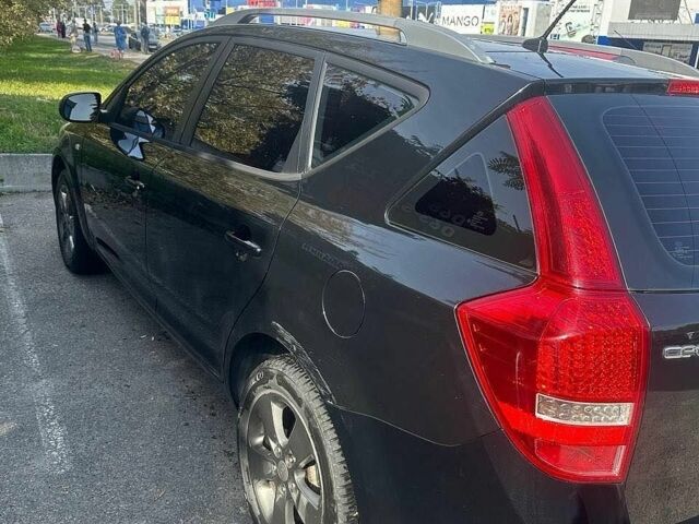 Чорний Кіа Сід, об'ємом двигуна 1.4 л та пробігом 227 тис. км за 5700 $, фото 1 на Automoto.ua