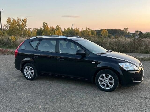 Чорний Кіа Сід, об'ємом двигуна 1.4 л та пробігом 206 тис. км за 5500 $, фото 1 на Automoto.ua