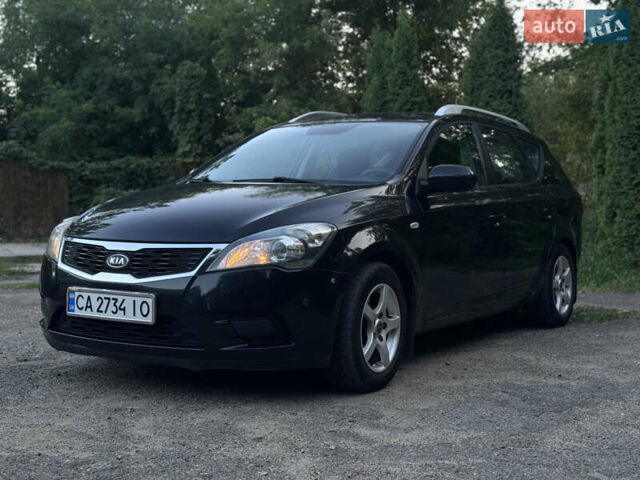 Чорний Кіа Сід, об'ємом двигуна 1.6 л та пробігом 200 тис. км за 7600 $, фото 1 на Automoto.ua