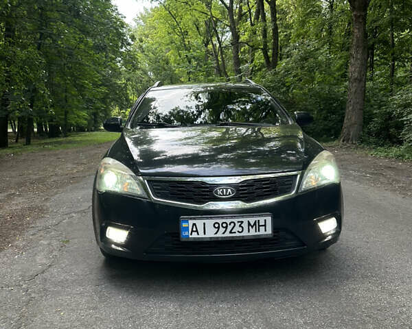 Чорний Кіа Сід, об'ємом двигуна 1.6 л та пробігом 252 тис. км за 6700 $, фото 1 на Automoto.ua