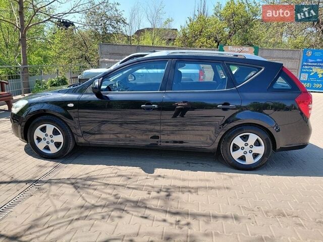 Черный Киа Сид, объемом двигателя 1.6 л и пробегом 194 тыс. км за 6950 $, фото 1 на Automoto.ua