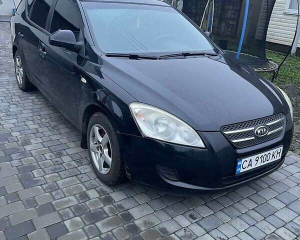 Чорний Кіа Сід, об'ємом двигуна 1.4 л та пробігом 175 тис. км за 5800 $, фото 1 на Automoto.ua