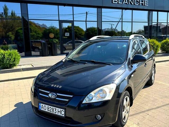 Чорний Кіа Сід, об'ємом двигуна 1.6 л та пробігом 28000 тис. км за 4499 $, фото 1 на Automoto.ua