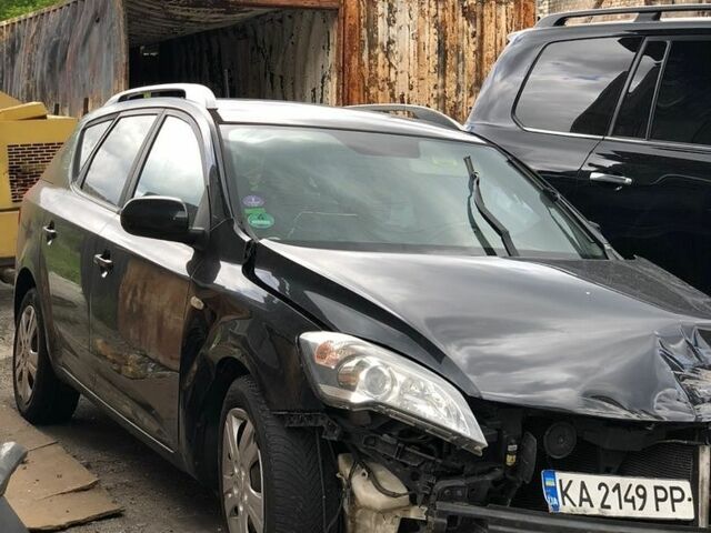 Чорний Кіа Сід, об'ємом двигуна 1.4 л та пробігом 235 тис. км за 1599 $, фото 1 на Automoto.ua