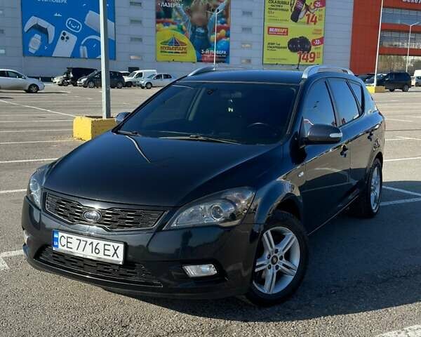 Чорний Кіа Сід, об'ємом двигуна 1.58 л та пробігом 286 тис. км за 7399 $, фото 1 на Automoto.ua
