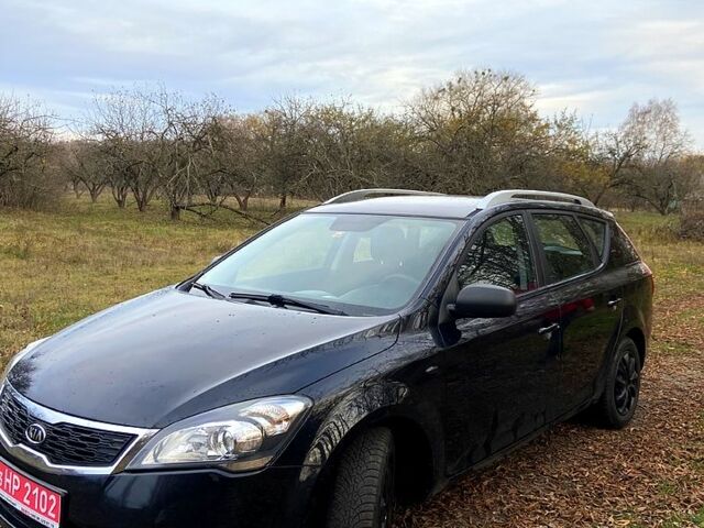 Чорний Кіа Сід, об'ємом двигуна 1.4 л та пробігом 205 тис. км за 6200 $, фото 1 на Automoto.ua