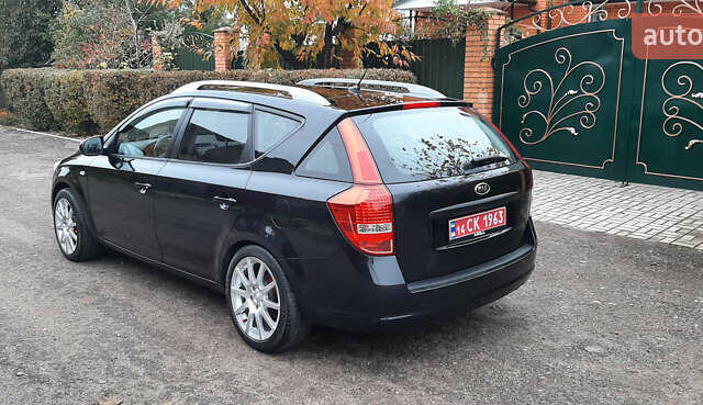 Чорний Кіа Сід, об'ємом двигуна 1.4 л та пробігом 211 тис. км за 6150 $, фото 1 на Automoto.ua