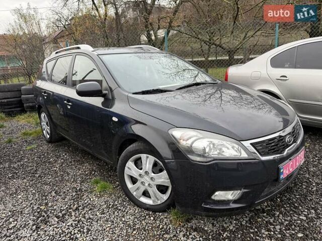 Черный Киа Сид, объемом двигателя 1.4 л и пробегом 220 тыс. км за 5950 $, фото 1 на Automoto.ua