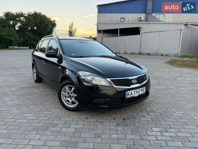 Чорний Кіа Сід, об'ємом двигуна 1.4 л та пробігом 210 тис. км за 5600 $, фото 1 на Automoto.ua