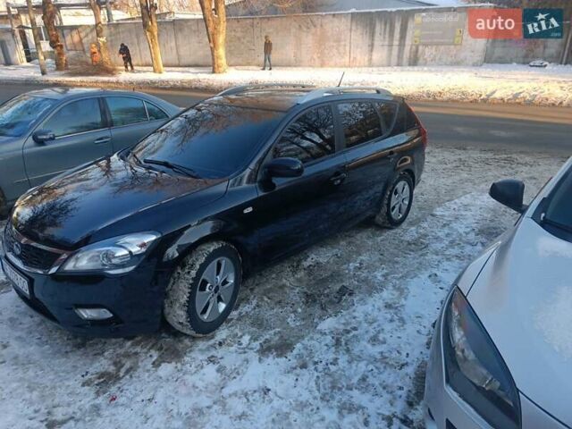 Чорний Кіа Сід, об'ємом двигуна 1.4 л та пробігом 174 тис. км за 5700 $, фото 1 на Automoto.ua