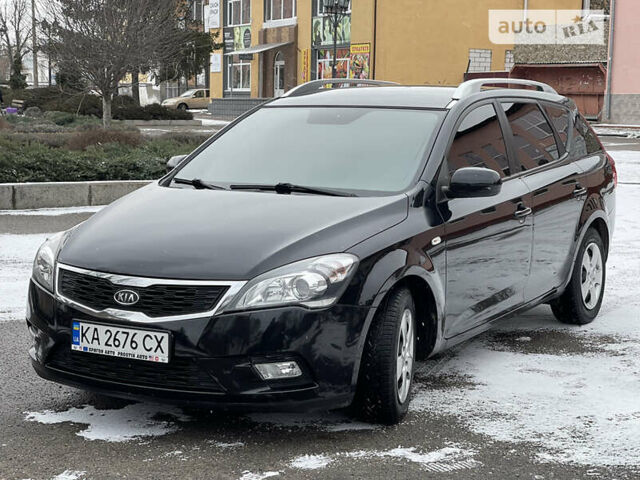 Черный Киа Сид, объемом двигателя 1.4 л и пробегом 220 тыс. км за 6400 $, фото 1 на Automoto.ua