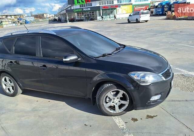 Чорний Кіа Сід, об'ємом двигуна 1.6 л та пробігом 186 тис. км за 6825 $, фото 1 на Automoto.ua