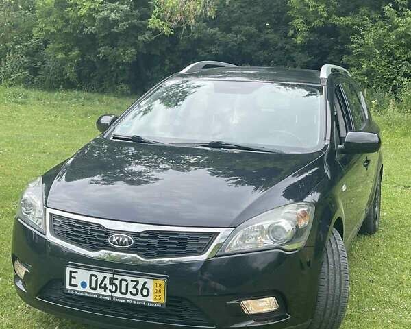 Черный Киа Сид, объемом двигателя 1.4 л и пробегом 150 тыс. км за 5800 $, фото 1 на Automoto.ua