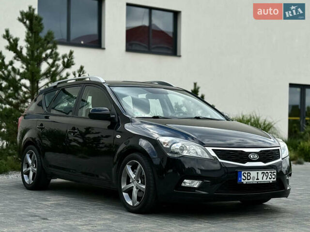 Черный Киа Сид, объемом двигателя 1.4 л и пробегом 207 тыс. км за 6399 $, фото 1 на Automoto.ua
