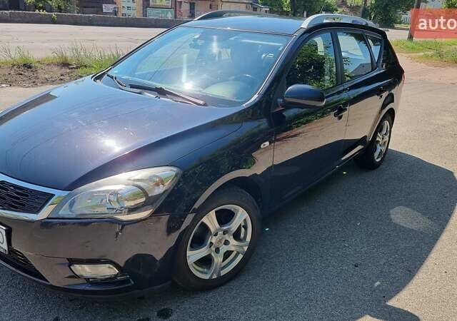 Чорний Кіа Сід, об'ємом двигуна 1.4 л та пробігом 230 тис. км за 6990 $, фото 1 на Automoto.ua