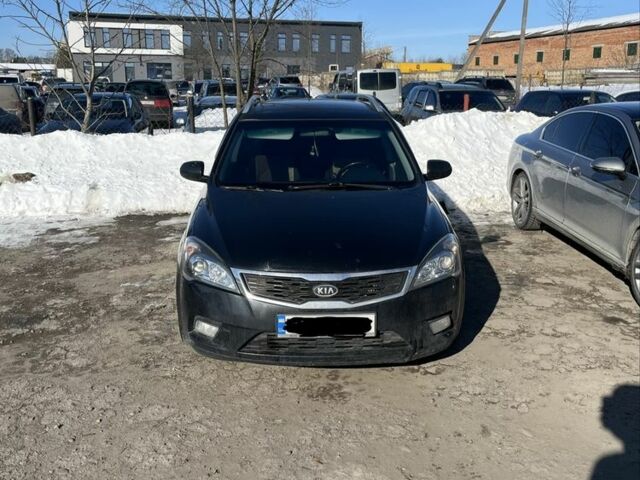 Черный Киа Сид, объемом двигателя 1.6 л и пробегом 247 тыс. км за 7000 $, фото 1 на Automoto.ua