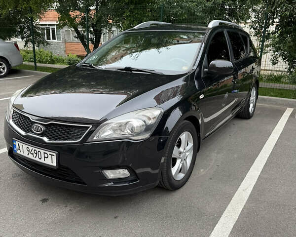 Черный Киа Сид, объемом двигателя 1.58 л и пробегом 216 тыс. км за 6399 $, фото 1 на Automoto.ua