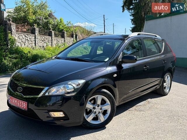 Черный Киа Сид, объемом двигателя 1.4 л и пробегом 194 тыс. км за 6990 $, фото 1 на Automoto.ua