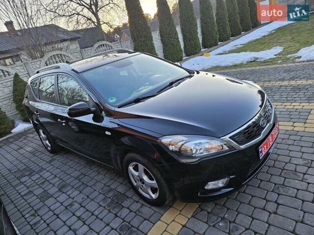 Чорний Кіа Сід, об'ємом двигуна 1.4 л та пробігом 236 тис. км за 6400 $, фото 1 на Automoto.ua