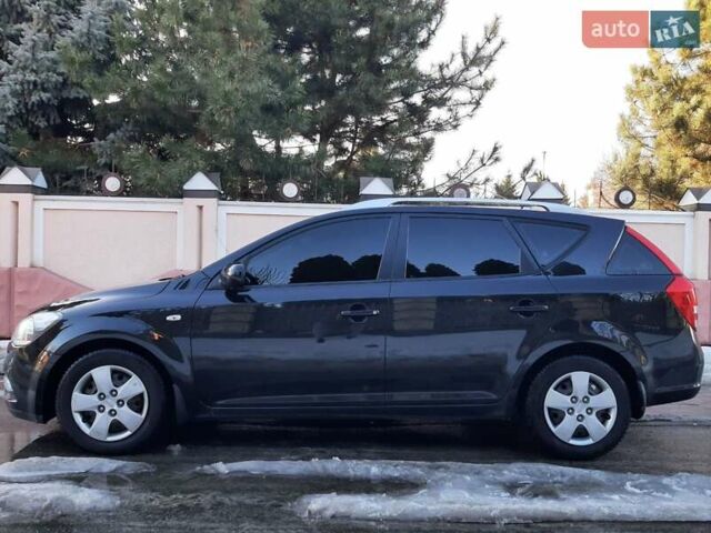 Чорний Кіа Сід, об'ємом двигуна 1.59 л та пробігом 206 тис. км за 7900 $, фото 1 на Automoto.ua