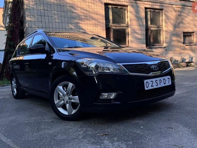 Черный Киа Сид, объемом двигателя 1.4 л и пробегом 232 тыс. км за 6950 $, фото 1 на Automoto.ua