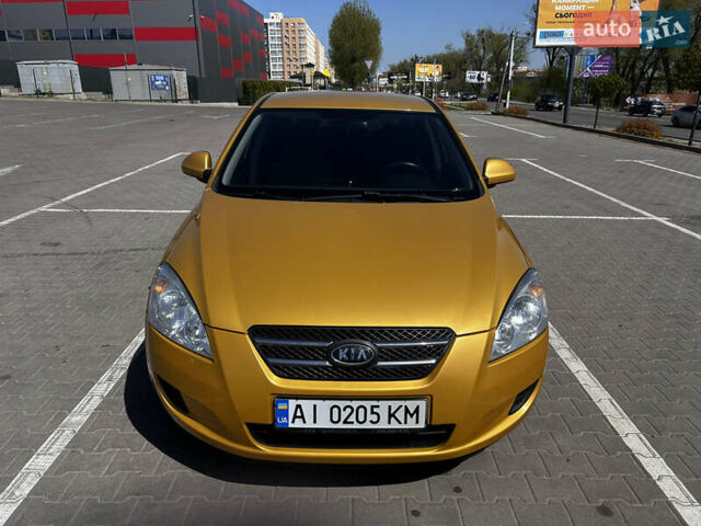 Желтый Киа Сид, объемом двигателя 1.6 л и пробегом 154 тыс. км за 6500 $, фото 1 на Automoto.ua